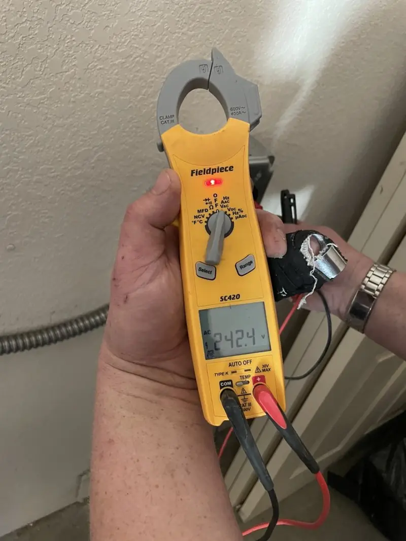 Voltage testing with clamp meter during Recessed Lighting Installation in DuPont